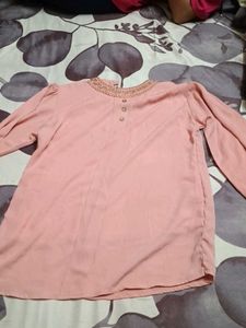 Elegant Peach top with Embellished Neckline
