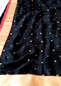 Elegant Black Saree with Gold Border