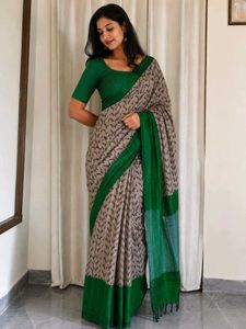 Elegant Printed Saree, comes with Green Blouse