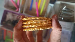 Set of 4 Elegant Gold Bangles