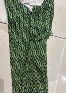 Stylish printed short kurti with square neck.
