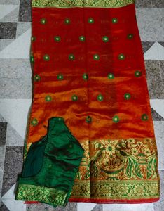 Orange Silk Saree with Green Blouse