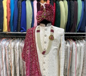 Elegant White Sherwani with Maroon Dupatta