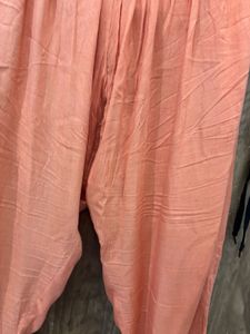 an elegant, cream-toned traditional Indian Kurta