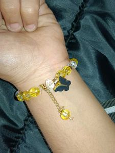 Charming Yellow Beaded Bracelet with Butterfly Cha