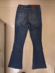 Distressed Flared Jeans