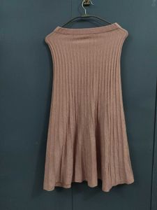 Chic Pink Ribbed Midi Skirt