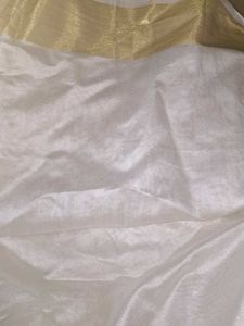 Elegant White and Gold Saree Onam