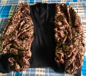 Chic Black Top with Animal Print Sleeves