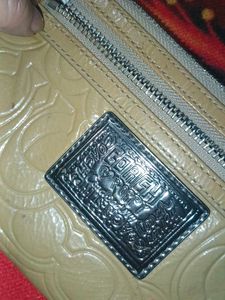 Coach Monogram Wristlet