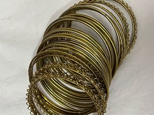 Elegant Gold-Tone Bangles with CZ Stones