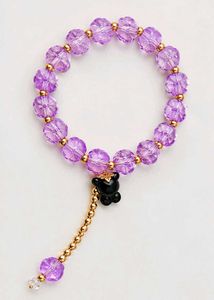 Purple Beaded Bracelet with Bear Charm