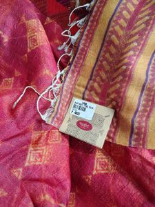 A  yellow colour  anarkali goun with red scarf
