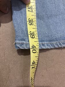 Light Wash Denim Jeans with Embroidered Detail