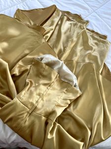 Elegant Gold Strapless Gown with Bow Detail