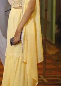 Elegant Yellow Ethnic Gown with cape and padded