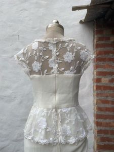 Elegant White Lace Peplum Gown