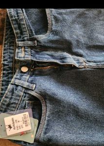 Ripped Wide Leg Denim Jeans