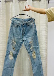 Light Wash Distressed Denim Jeans