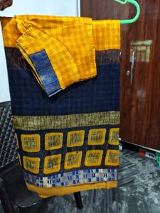 Yellow printed saree with stiched blouse ...