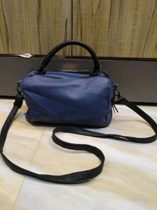 Stylish Blue Handbag with Eyelet Details
