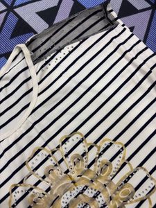 Chic Striped Top with Embellished Flower