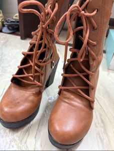 Stylish Brown Lace-Up Boots with Embellishments