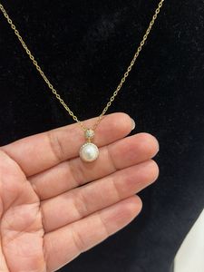 Brand new Elegant Pearl & Diamond Necklace