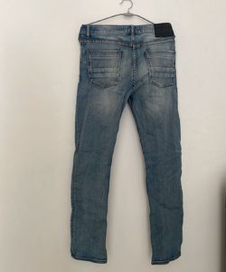 Distressed Blue Jeans