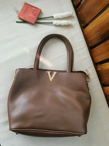 Chic Brown Handbag with V Accent