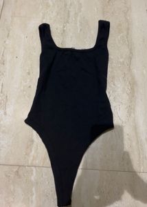 Sleek Black Ribbed Bodysuit