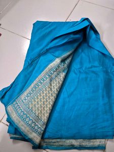 Vibrant Teal Saree with Striped Blouse