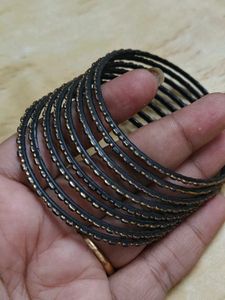 Set of 8 Black &amp; Gold metal Bangles