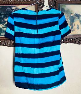 Top With Blue Colour Shades Straps Having  Chain In Back