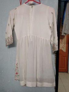 Farashi sharara and peplum top fully embroidered.