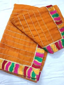 Vibrant Orange Saree with Striped Pattern