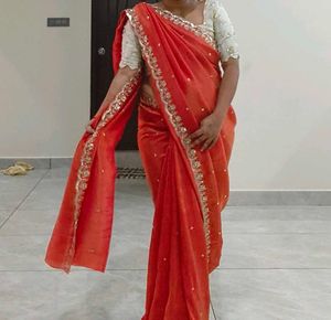 Orange Pure Tissue Embroidered saree