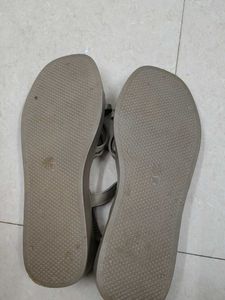 A khaki coloured women sandals