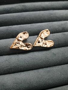 Gold Heart Statement Earrings