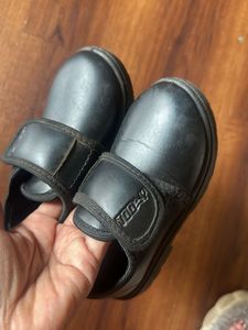 Black school shoes in size 8