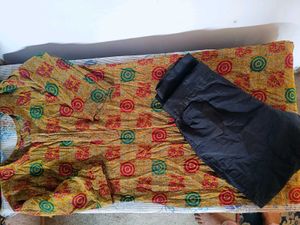 Yellow Printed Kurta with Black Pants