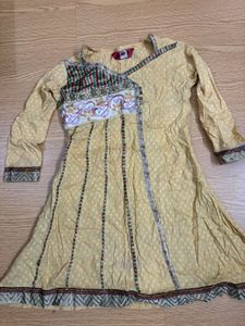Beautiful Yellow Embroidered Kurta with churidar