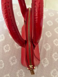 glossy red mini handbag