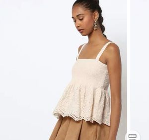 Smocked Eyelet Peplum Top