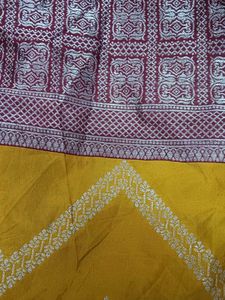 unstitched yellow banarsi suit