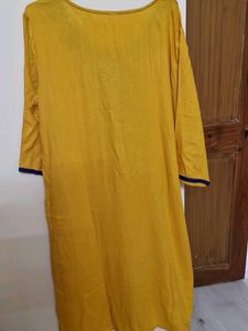 Elegant Yellow Kurta with Embellished Neckline