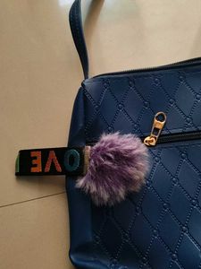 Stylish Blue Crossbody Bag with Pom-Pom