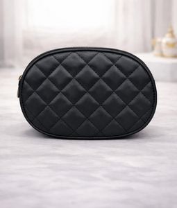 Black Quilted Oval Crossbody Bag