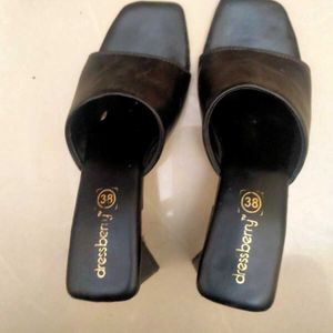 black triangular heels
