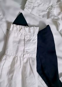 Chic White Ruffled Blouse with Black Bow 🤍